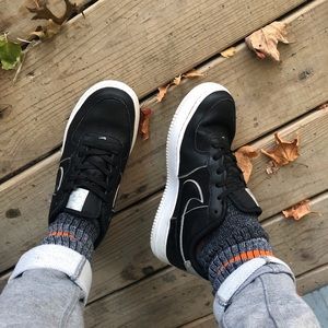 black with holographic detailing nike airforce 1’s